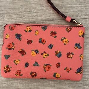 Floral pink Coach wristlet wallet